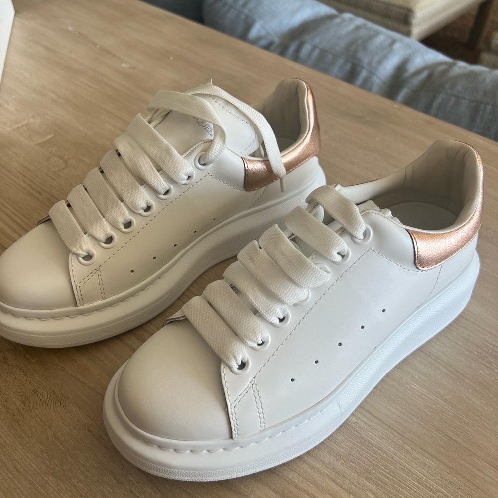 Brand new never been worn Alexander McQueen sneakers in rose gold size 8.5